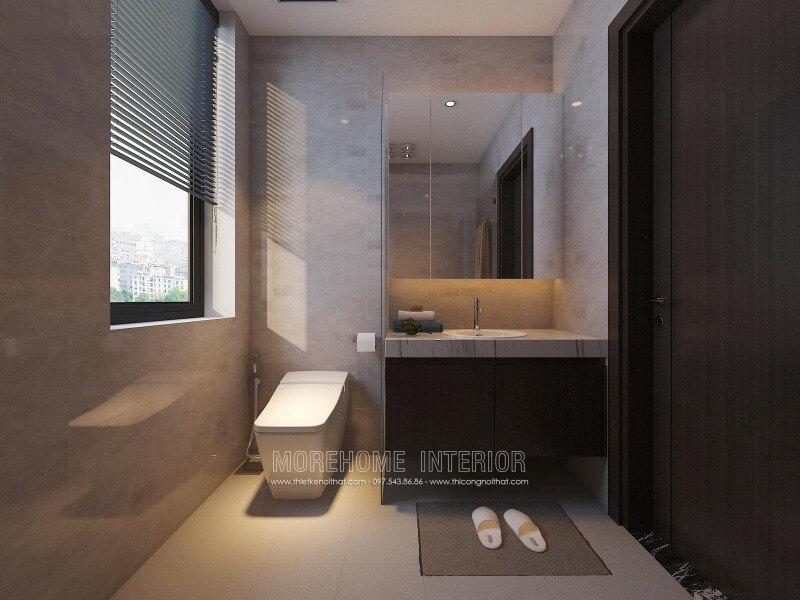 Tủ phòng tắm sẫm màu kết hợp cùng mặt bàn đá lavabor cùng bố trí hiện đại giúp cho phòng tắm nhỏ trở nên đẹp, sang trọng và đầy tiện ghi. Thiết kế nội thất