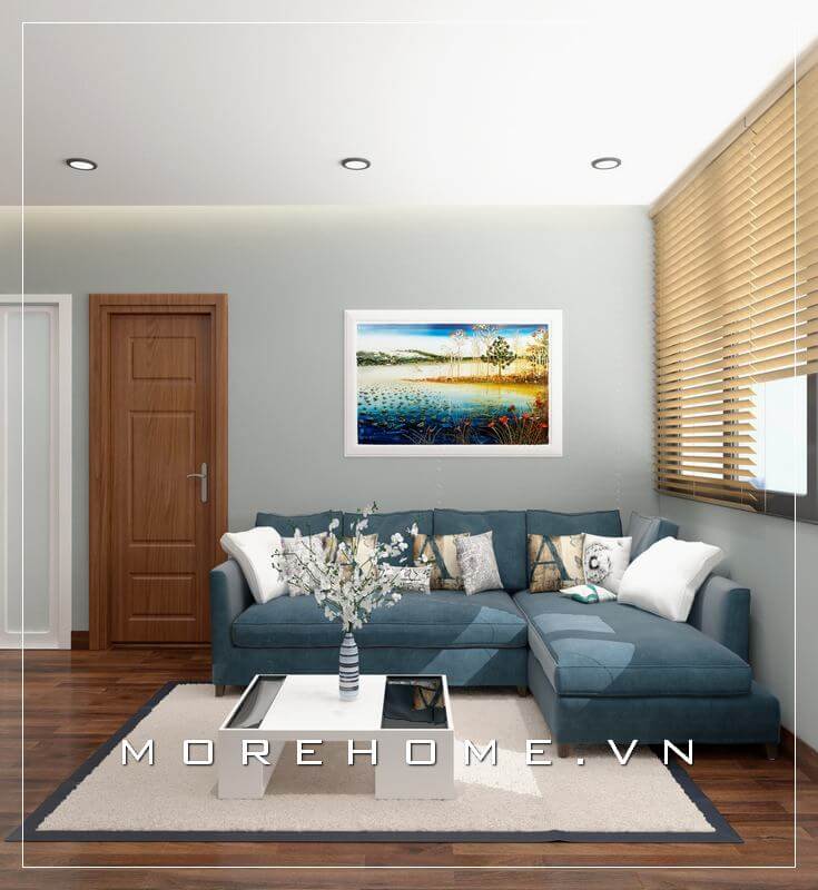 Mẫu sofa bọc vải thiết kế với phong cách hiện đại kiểu dáng góc tiết kiệm không gian và ấn tượng thu hút bởi tone xanh độc đáo cho phòng khách chung cư đầy sức sống. Thiết kế nội thất