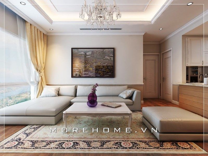 Sự góp mặt của chiếc bàn trà trắng giúp không khí gia đình trở nên ấm cúng và đoàn tụ hơn.