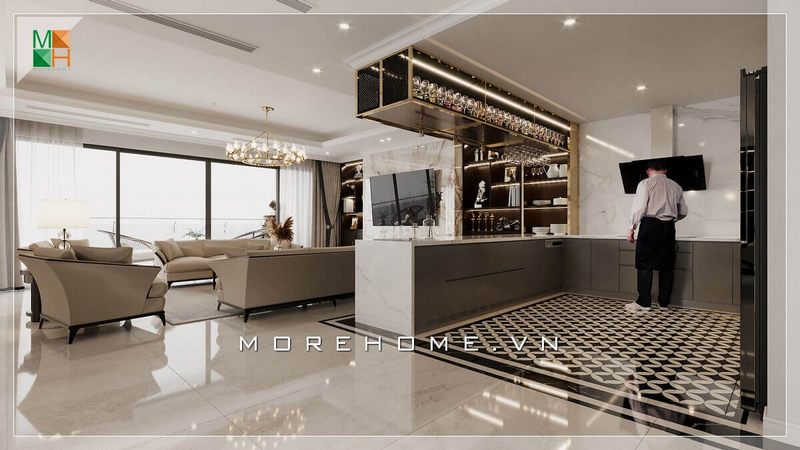 Ấn tượng với mẫu không gian phòng bếp rộng hiện đại, thiết kế bếp có dạng quầy bar đẹp mắt sáng tạo tiện lợi vừa có công dụng là kệ để đồ trang trí vừa có thể là nơi ngăn cách giữa bếp và phòng khách, kệ treo bếp còn là nơi trưng bày nhũng cái ly xinh xắn, những cái cốc thủy tinh lóng lánh.